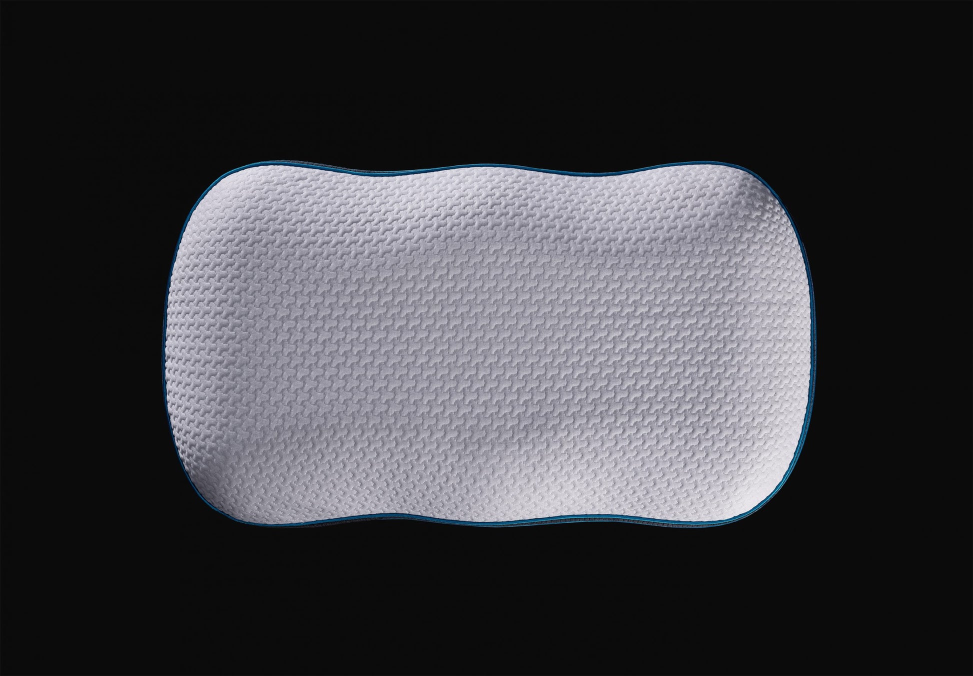 An image of the ErgoPillow, featuring its ergonomic design and plush comfort for optimal neck and head support during sleep.